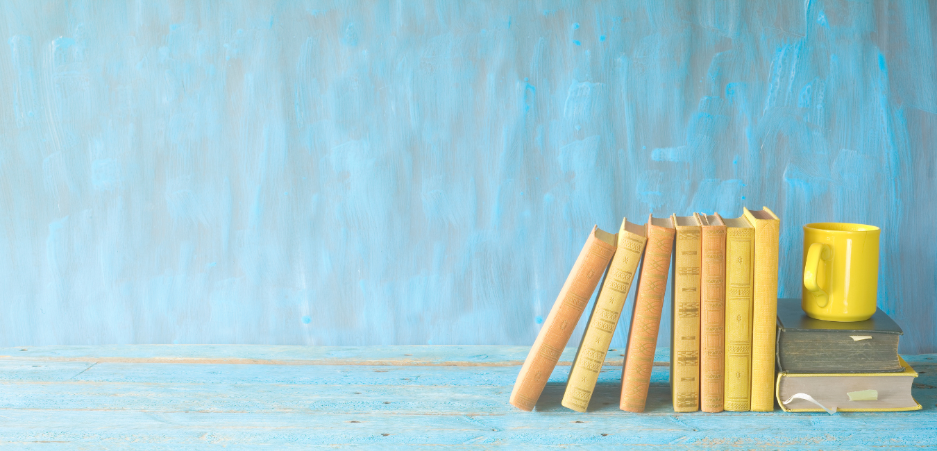 a picture of painted over wood with a stack of books